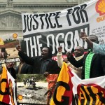 Anti-Shell protesters in New York representing the Ogoni people.	(AP Photo/Bebeto Matthews)