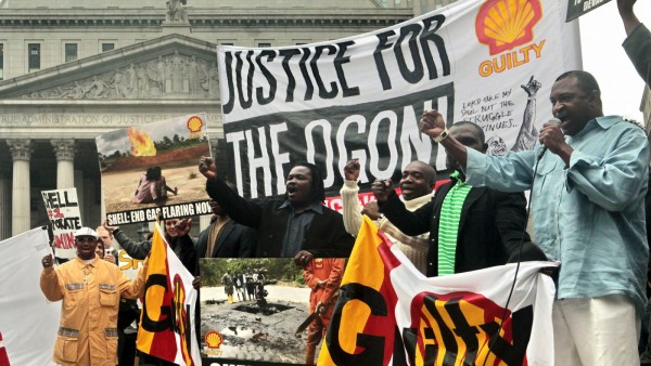 Anti-Shell protesters in New York representing the Ogoni people.(AP Photo/Bebeto Matthews)