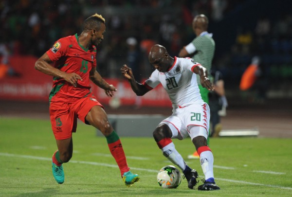 Brito E Silva Toni of Guinea Bissau challenges Yacouba Coulibaly of Burkina Faso during the Afcon Group A match between Guinea Bissau and Burkina Faso on the 22 January 2017 at Franceville , Gabon Pic Sydney Mahlangu/ BackpagePix