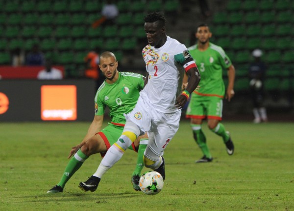 Serigne Mbodji of Senegal is challenged by Sofiane Hanni of Algeria during the Afcon Group B match between Senegal and Algeria on the 23 January 2017 at Franceville , Gabon Pic Sydney Mahlangu/ BackpagePix