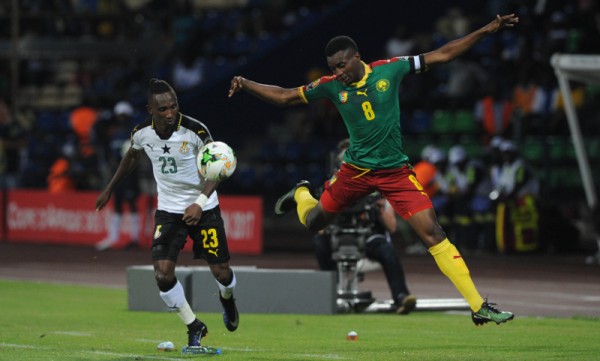 Harrison Afful of Ghana challenges Benjamin Moukandjo of Cameroon during the 2017 Africa Cup of Nations Finals Afcon semifinal football match between Cameroon and Ghana at the Franceville Stadium in Gabon on 02 February 2017 ©Sydney Mahlangu/BackpagePix