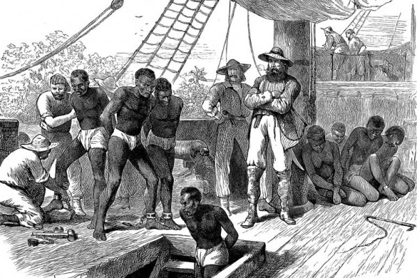 Captives being brought on board a slave ship on the West Coast of Africa (Slave Coast), c1880. Ann Ronan Pictures/Print Collector/Getty Images