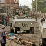 UN peacekeepers conduct a patrol in the volatile neighbourhood of Bel Air in the Haitian capital, Port-au-Prince in April 2004.